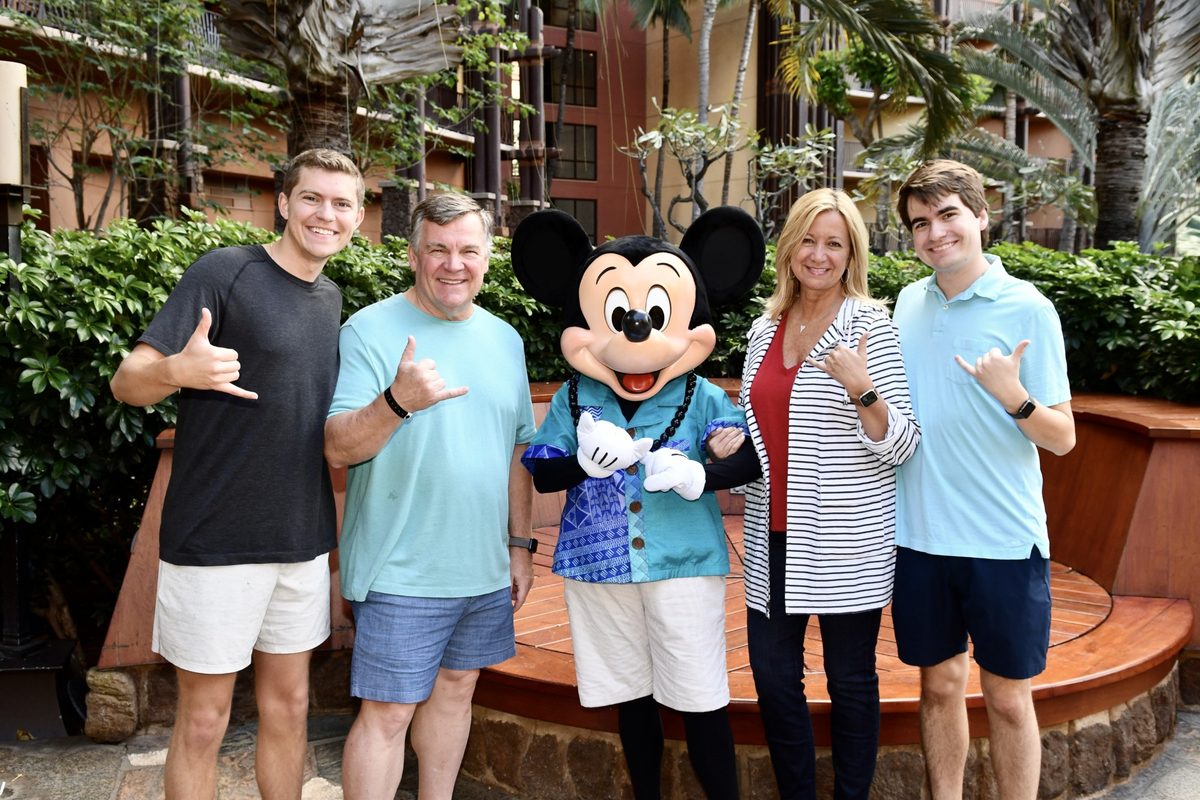 Lori Webb family with Mickey Mouse at Disney's Aulani Resort in Hawaii