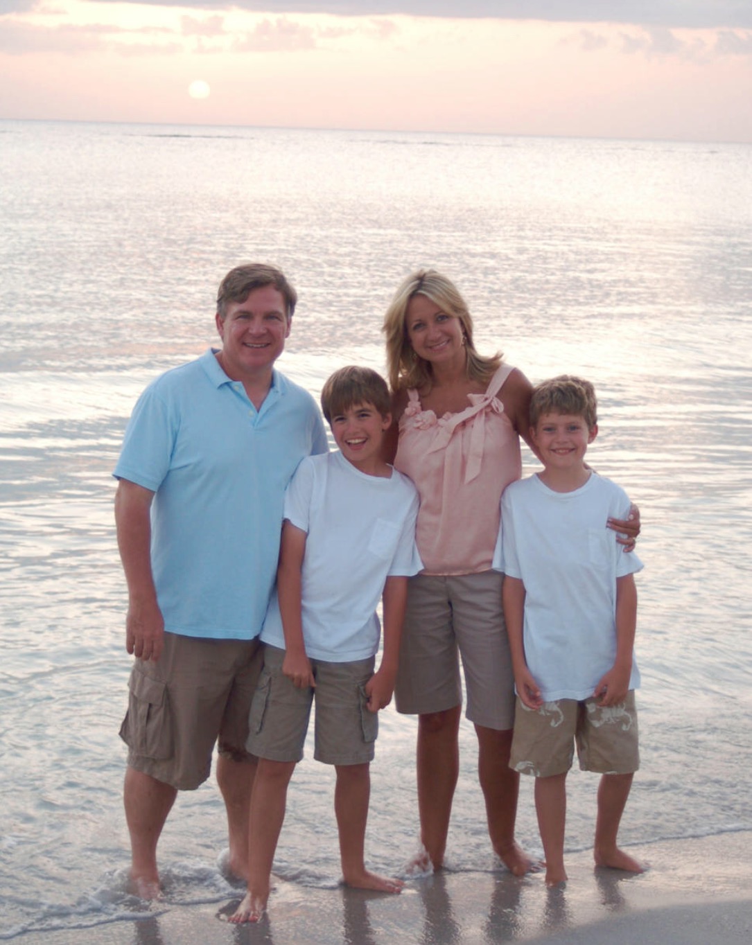 Lori Webb and family at beach sunset in Florida