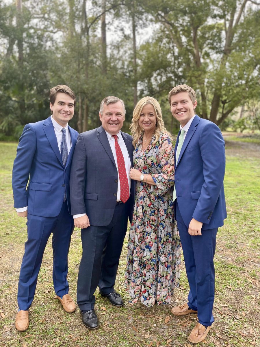 Lori Webb and family dressed up at a family wedding